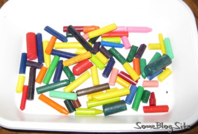 box of broken, peeled crayons