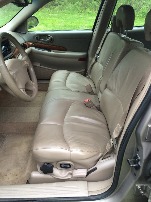 image of the front bench seat of a 2001 Buick LeSabre beige