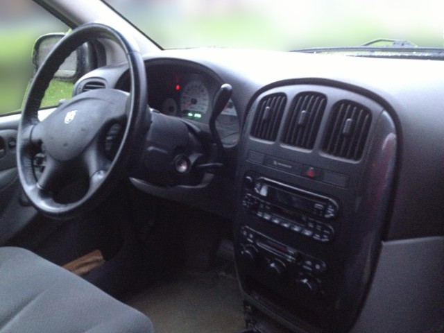 image of dashboard of old minivan