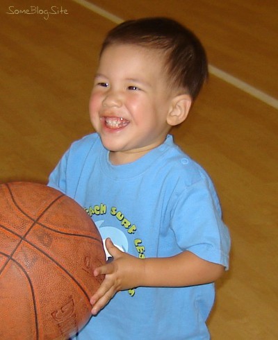 picture of a happy boy with a ball