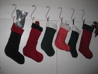 photo of Christmas stockings hung by a closet door instead of a fireplace