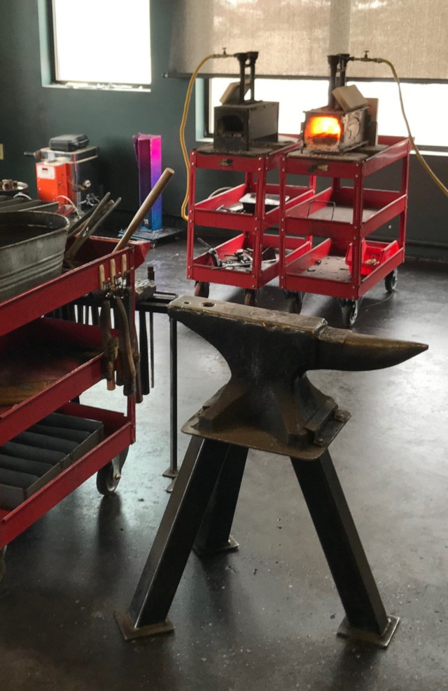 image of a forge and anvil setup