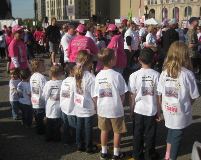 picture of grandchildren with grandmother at race for the cure