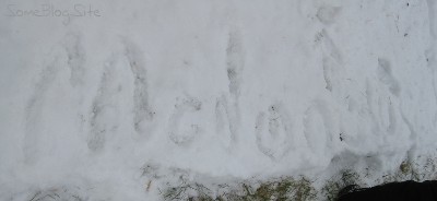 picture of roads drawn in the snow on the lawn