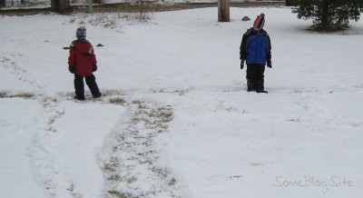 picture of roads drawn in the snow on the lawn