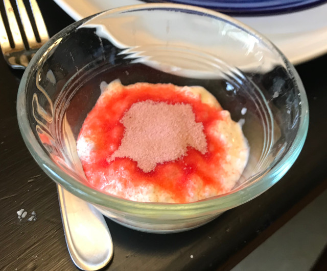 image of jello flavored gelatin powder on cottage cheese in a small bowl