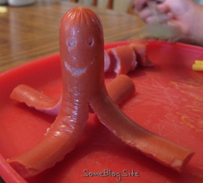 hot dog cut into an octopus shape
