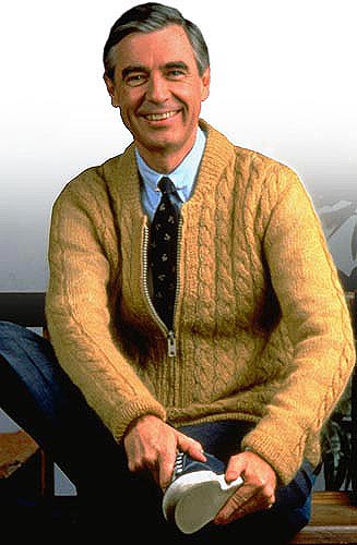 Mr. Rogers wearing a plain cardigan sweater