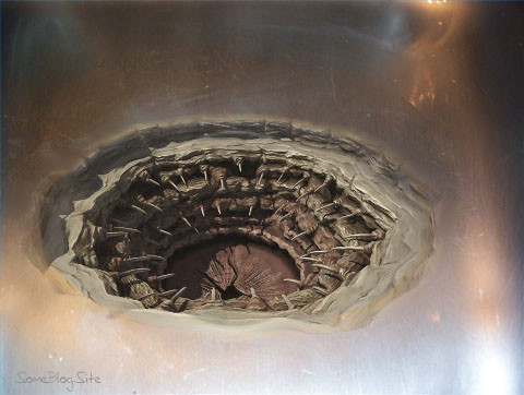 image of a garbage disposal that resembles the Sarlacc, in a sink instad of the Great Pit of Carkoon