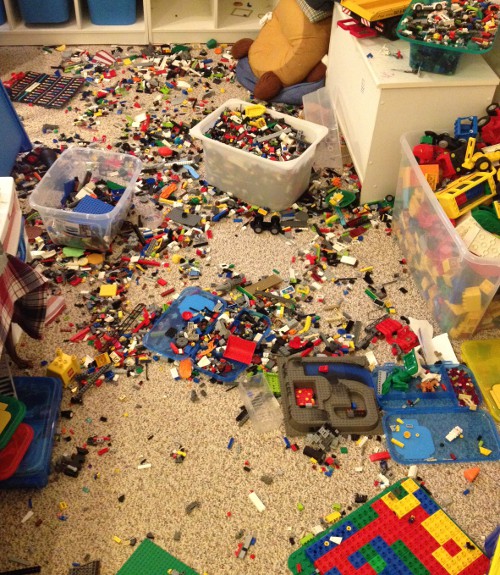 image of floor full of scattered Lego bricks
