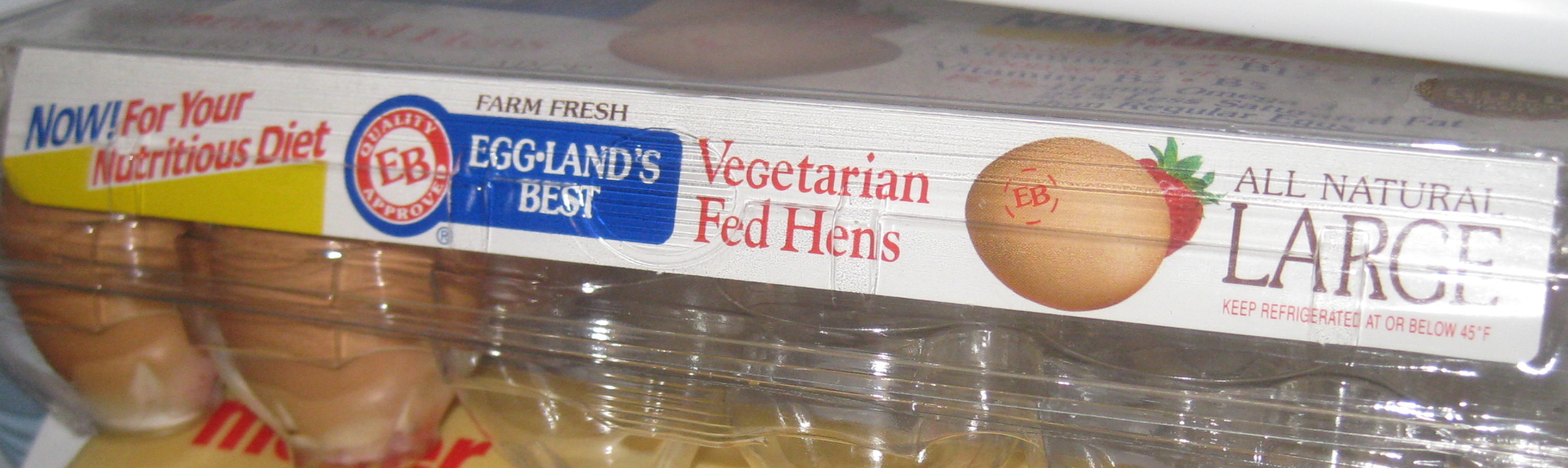 photo of a container of Eggland's Best eggs, particularly the part about Vegetarian Fed Hens