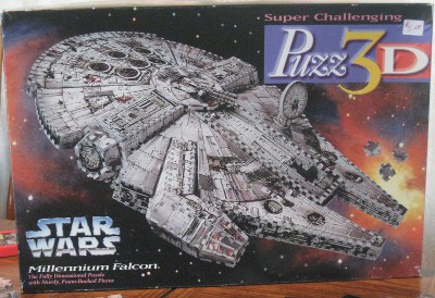 picture of the box for the 3-D puzzle of the Millennium Falcon