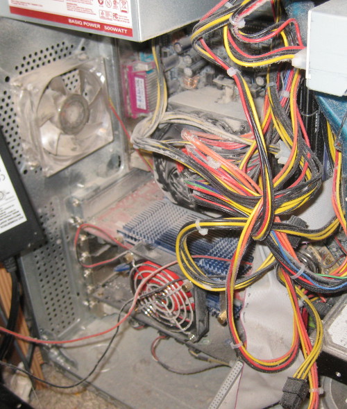 photo of the dusty inside of a tower computer