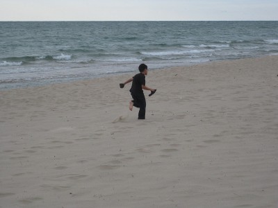child running on a beach