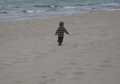 child running on a beach