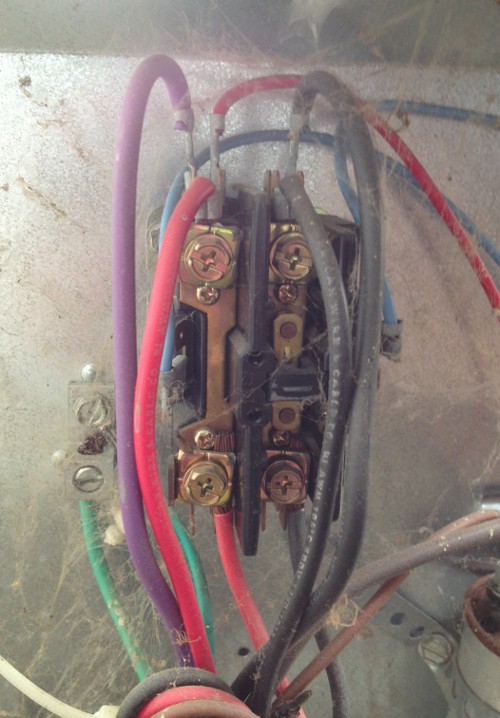 image of the relay or contactor in a central air conditioning system