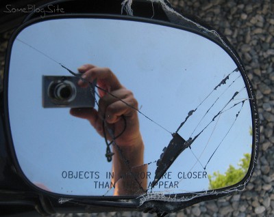 photo of a broken side mirror from a vehicle