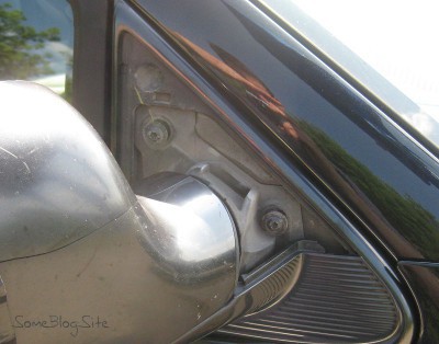 photo of the open plastic fairing for the minivan side mirror