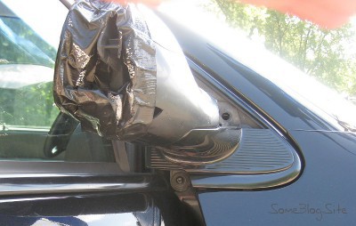photo of the third bolt holding the mirror for a Dodge Grand Caravan