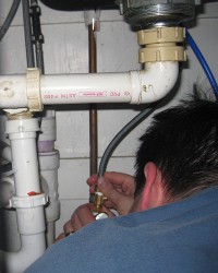 working under the kitchen sink