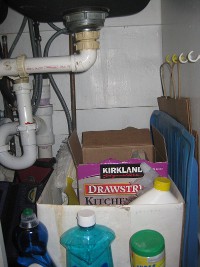 working under the kitchen sink