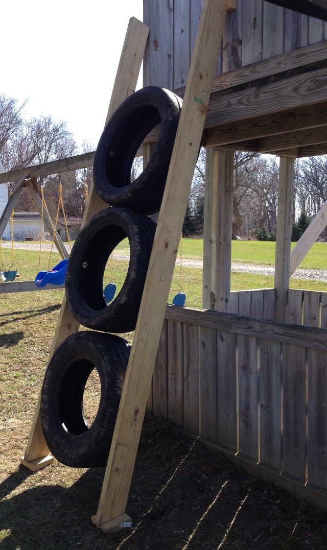 image of a completed tire ladder on a children's playground