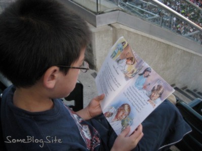 picture of child reading a book