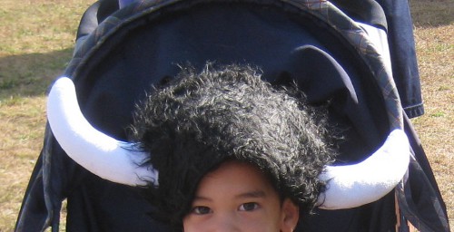 photo of child wearing a Warrior Dash helmet