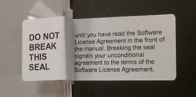 picture of a CD with an unbroken EULA seal