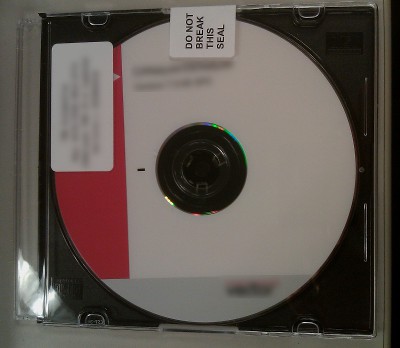 picture of a CD with an unbroken EULA seal