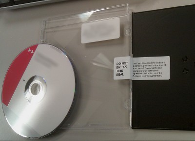 picture of a CD with an unbroken EULA seal