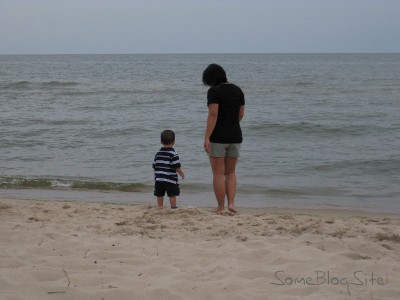 picture of mother and child walking on the Lake Michigan beach at Maranatha