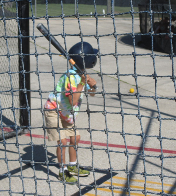 image of the children in the batting cages at Craig's Cruisers in Muskegon, MI