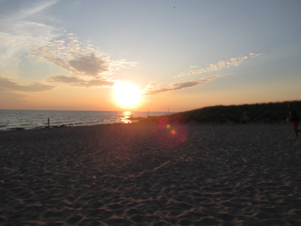 image of the sunset on Lake Michigan at the beach of Maranatha Bible and Missionary Conference in Norton Shores, MI