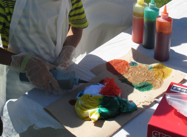 image of people making tie-dye shirts at Maranatha Bible and Missionary Conference in Norton Shores, MI