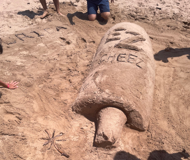 image of sand sculpture of a spray can of easy cheese at Maranatha Bible and Missionary Conference in Norton Shores