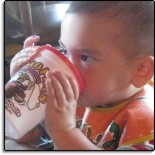 picture of a child drinking from a cup at Buffalo Phil's