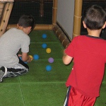 picture of children playing with foam balls at the Wilderness Resort