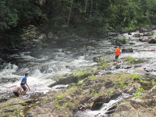 image of children playing in Dead River Falls
