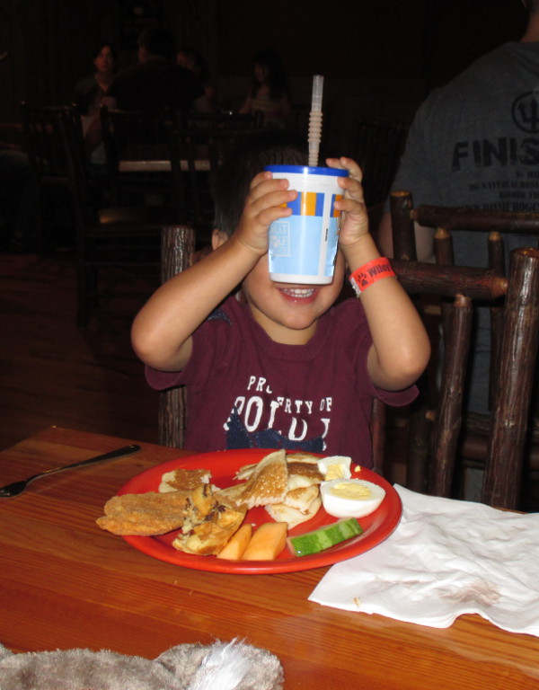 photo of a child eating breakfast at Camp Critter Buffet at Great Wolf Lodge