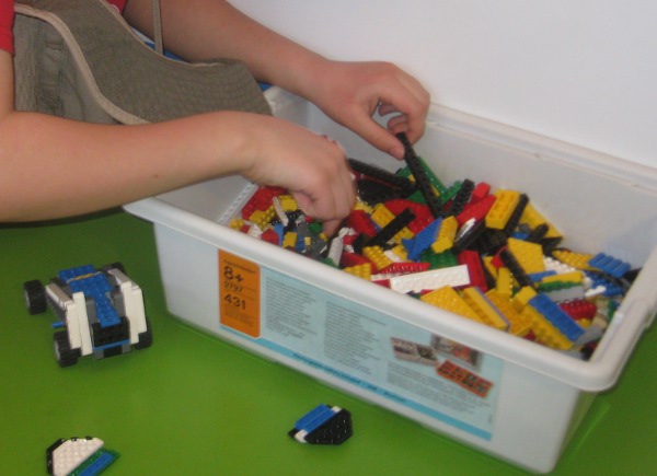 photo of someone building something with Lego bricks at Legoland in Orlando, FL