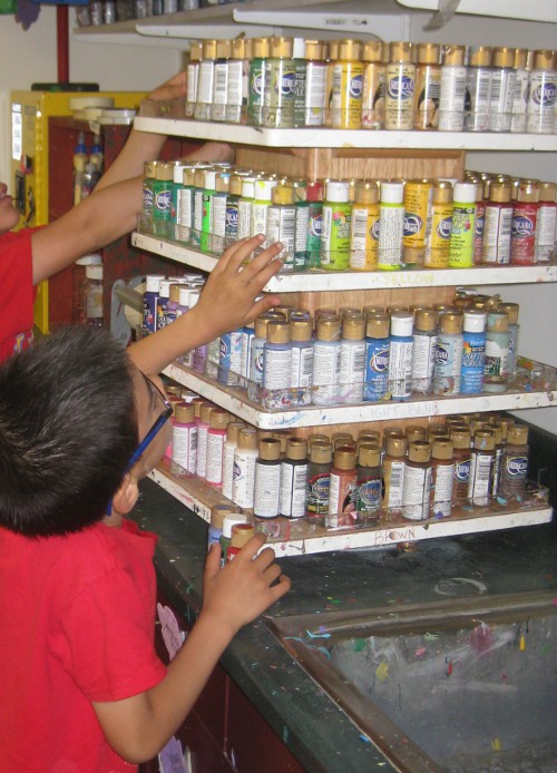 photo of the children looking at paints in the craft room at Pokagon State Park in Angola Indiana