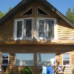 picture of a pine lakefront cabin