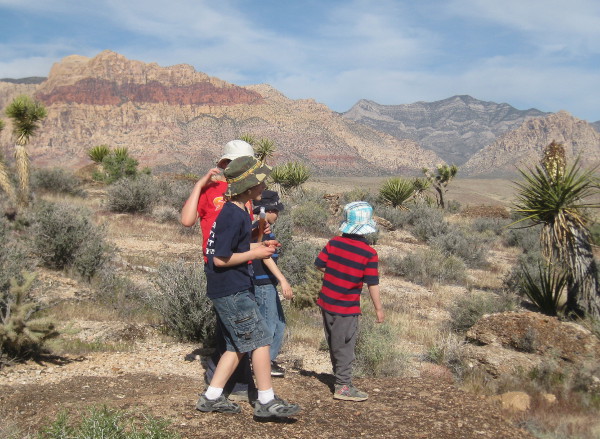 photo of children hiking near Red Rock Canyon in Nevada