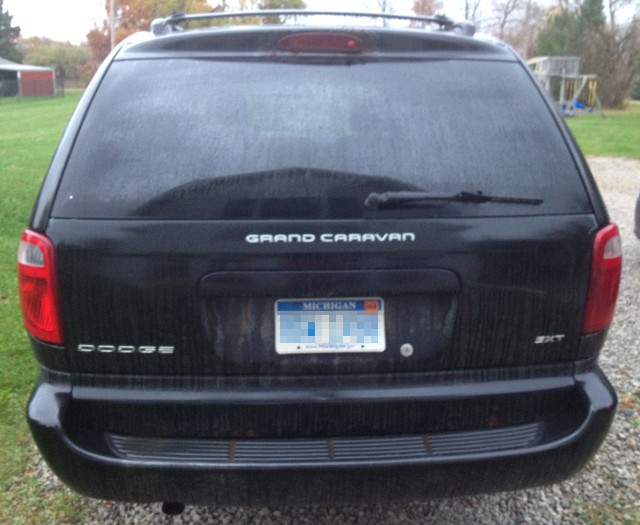 image of back hatch of old minivan