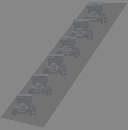 image of cars driving in a line at dusk