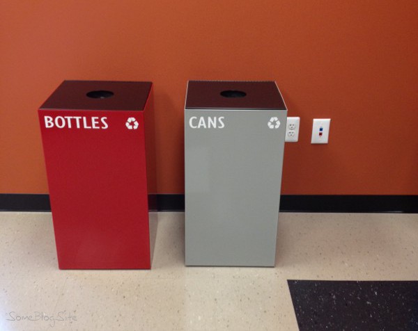 photo of recycling bins labelled bottles and cans