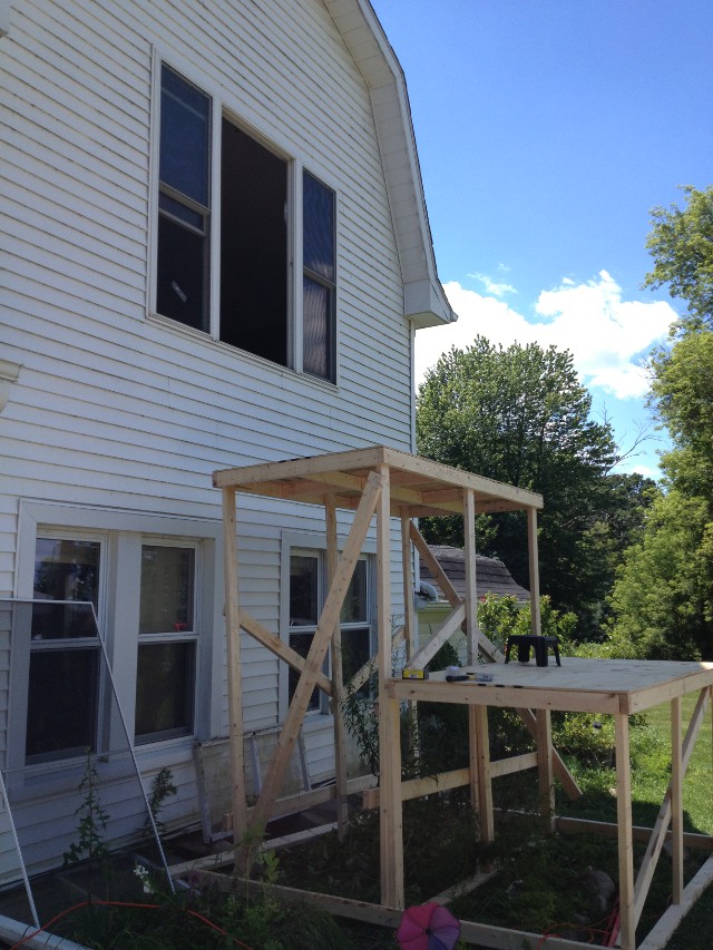 image of a makeshift scaffolding built out of 2x4s