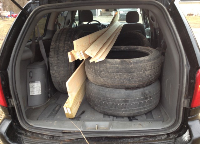 image of old tires in the back of a van