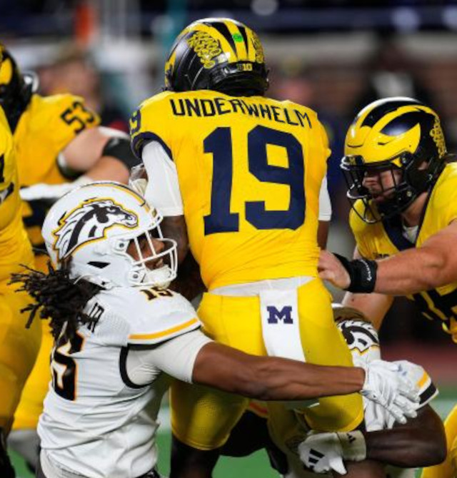 photo of University of Michigan football quarterback Bryce Underwood but with his jersey renamed to Underwhelm